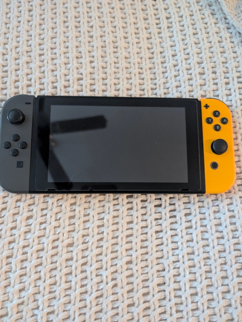 Nintendo Switch Console with Orange and Black Joy-Con (+ Extra Screen Protector) - Picture 2 of 7